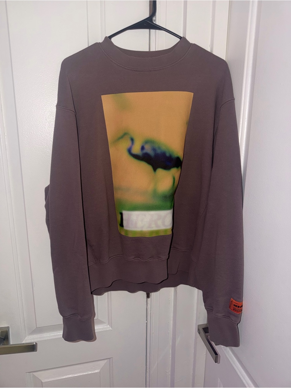 Heron Preston Brown Hoodie with blurry Heron graphic